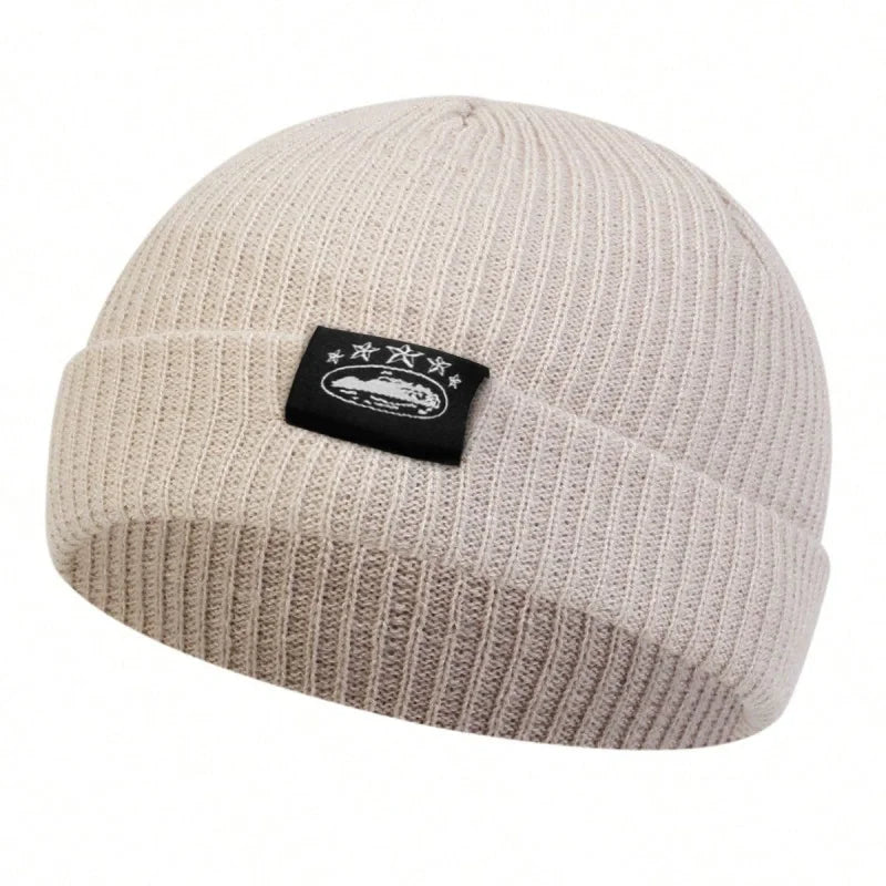 Bonnets unisexe avec étiquette de plusieurs sortes, chapeau chaud d'hiver, bonnet pour femmes et hommes.