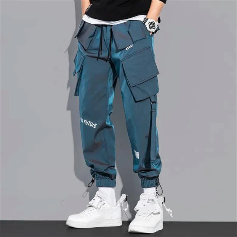 Mince Streetwear pantalons décontractés hommes rubans sarouel Jogging pantalon mâle coupe ajustée printemps Cargo pantalon multi-poches femmes pantalon K12